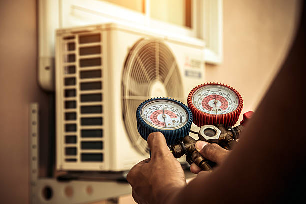 Professional Air Conditioning Service technician working in Waverly, NY